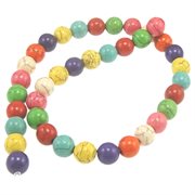 Howlit - Turkis perler i blandede farver. 10 mm streng.